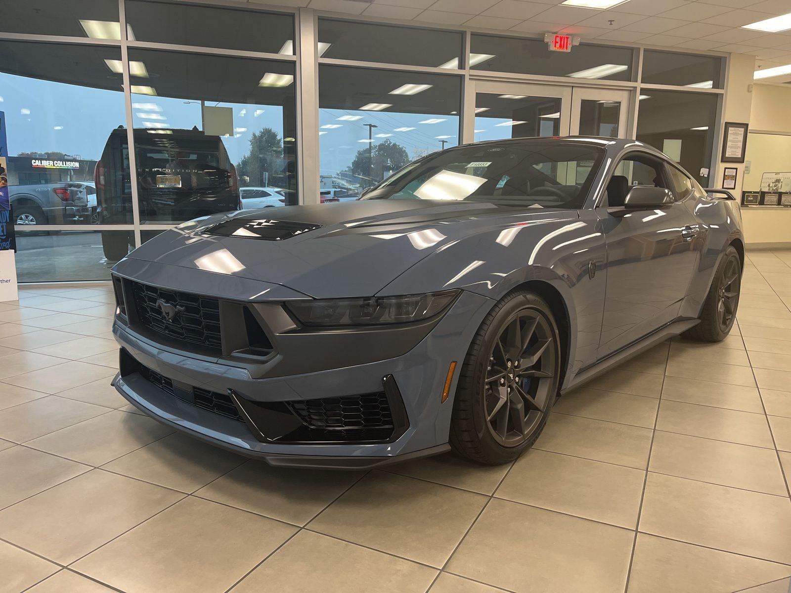 2025 Ford Mustang Dark Horse Fastback in Vapor Blue — front three-quarter view